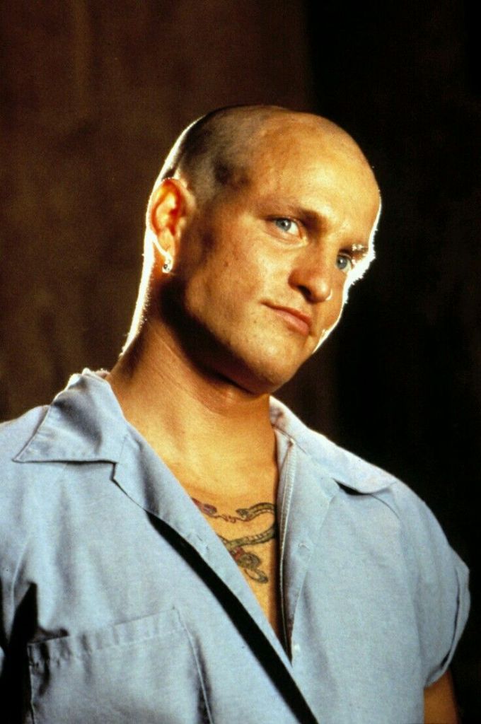 Close up of Mickey Knox from Natural Born Killers, his calm and confident expression reflecting the character's composed demeanor during violent events.